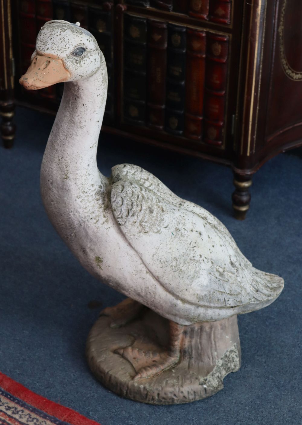 A reconstituted stone garden ornament of a goose, H.56cm